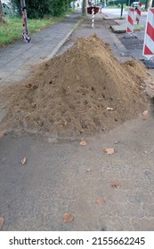 There Is A Big Pile Of Sand On The Construction Site