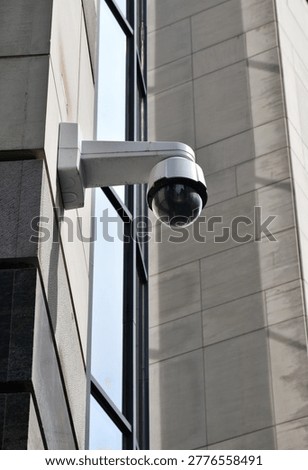 There is a CCTV camera installed on the building. City safety.