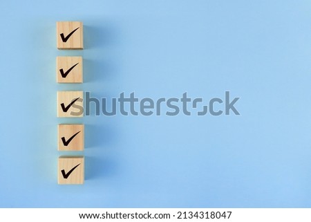 There are five blocks with check marks.