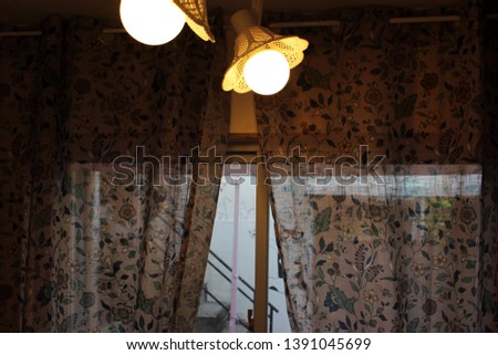 Similar – Space. Wallpaper with forest motif, in the mirror is reflected a red and white chequered curtain and a neon tube. Lost taste, in need of renovation.