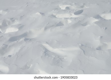 There are footprints on snow field