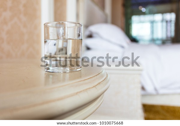 There Glass Water On Nightstand Glass Stock Photo Edit Now 1010075668