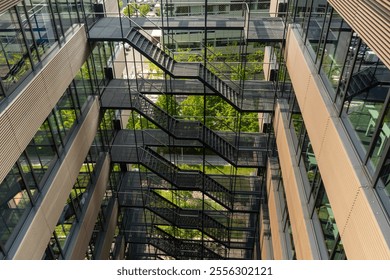 There is a large and impressive building featuring numerous stairs that ascend and descend for various purposes