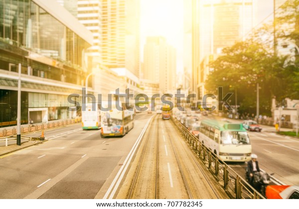 There are many modes of transport on\
urban street including private car,taxi,tram and double-decker\
bus,etc.Hong\
Kong,China,Asia.