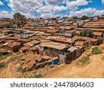 There are many poor houses in slums with high population density. The concept of poverty in third World countries.