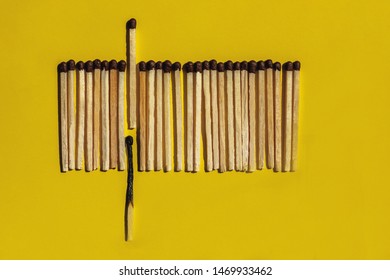 There are no irreplaceable people in this world concept. The burned wooden match stick is quickly replaced by a new one on yellow background.