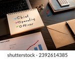 There is notebook with the word Chief Operating Officer. It is as an eye-catching image.