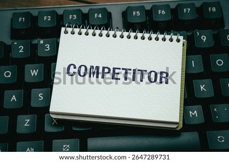 There is notebook with the word Competitor. It is as an eye-catching image.