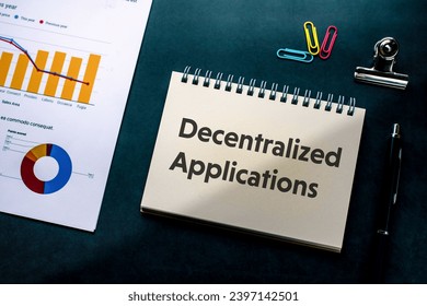There is notebook with the word Decentralized Applications. It is as an eye-catching image.