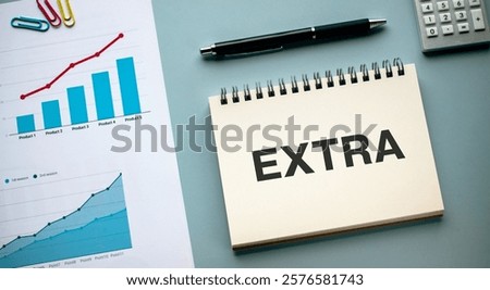 There is notebook with the word EXTRA. It is as an eye-catching image.