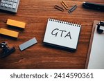 There is notebook with the word GTA. It is an abbreviation for Grounded Theory Approach as eye-catching image.