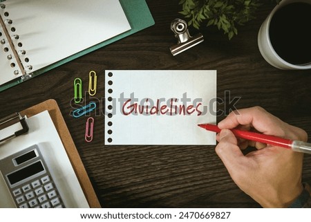 There is notebook with the word Guidelines. It is as an eye-catching image.