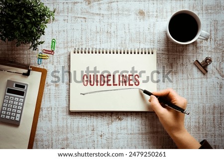 There is notebook with the word Guidelines. It is as an eye-catching image.