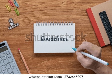 There is notebook with the word Guidelines. It is as an eye-catching image.