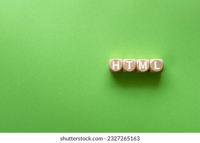 There is notebook with the word HTML. It is as an eye-catching image.