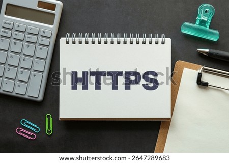 There is notebook with the word HTTPS. It is an abbreviation for Hypertext Transfer Protocol Secure as eye-catching image.