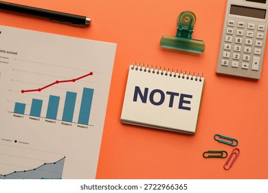 There is notebook with the word NOTE. It is as an eye-catching image.