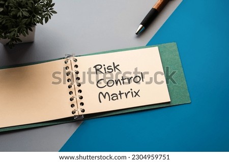 There is notebook with the word Risk Control Matrix. It is an abbreviation for Risk Control Matrix as eye-catching image.