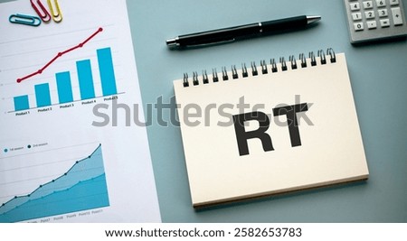 There is notebook with the word RT. It is an abbreviation for Retweet as eye-catching image.