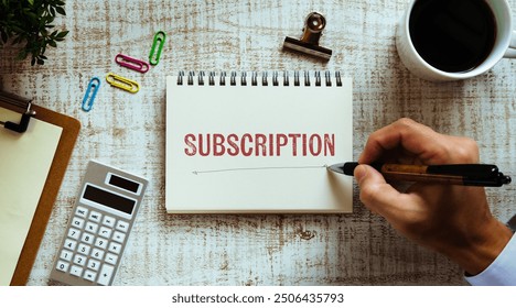 There is notebook with the word Subscription. It is as an eye-catching image. - Powered by Shutterstock