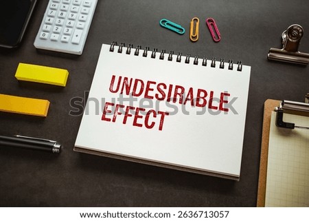 There is notebook with the word Undesirable Effect. It is as an eye-catching image.