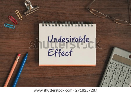 There is notebook with the word Undesirable Effect. It is as an eye-catching image.