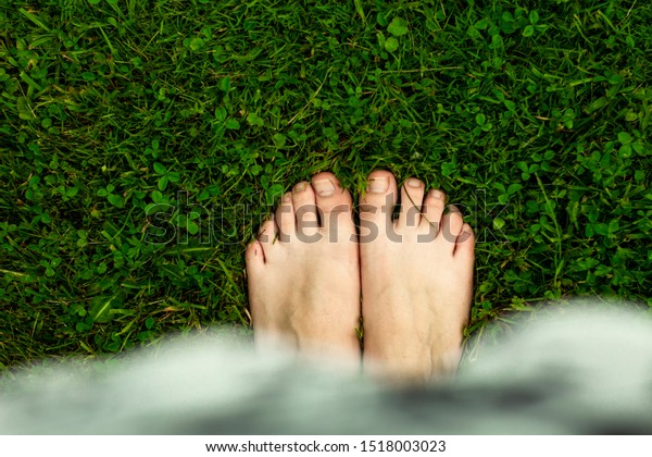 There is nothing better to walk on the wet\
lawn, after the rain,\
barefoot.