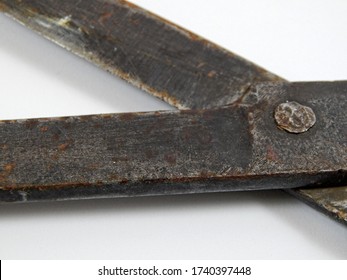 There Are Old Rusty Fabric Scissors That Are Over 70 Years Old.