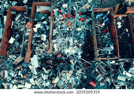 There is a lot of old rusty metal in the pile. Scrap metal sorting. Aerial photography
