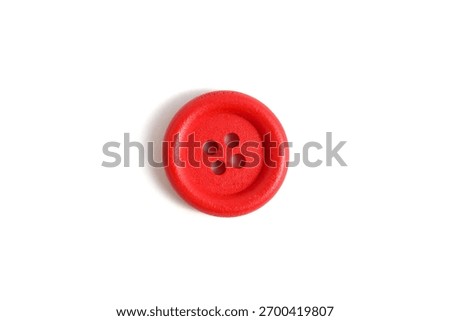There is one red button on a white background.