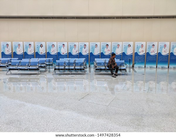 There is only one patient waiting in the waiting\
hall of the hospital.Located in Tiantan hospital.September 1, 2019,\
Beijing, China.