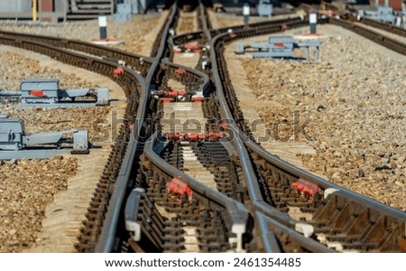 There are paths diverging in different directions. Switches on the rails.