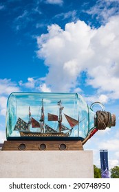 There is ship in the bottle.