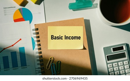 There is sticky note with the word Basic Income. It is as an eye-catching image.