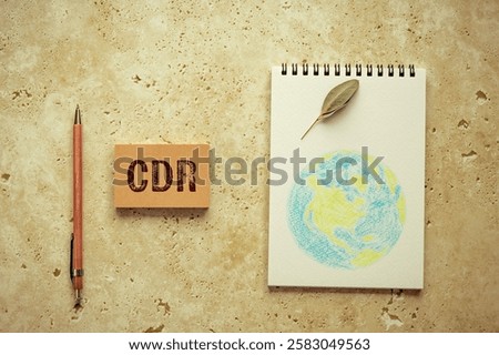There is sticky note with the word CDR. It is as an eye-catching image.