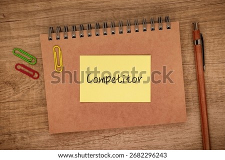 There is sticky note with the word Competitor. It is as an eye-catching image.