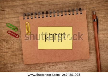 There is sticky note with the word HTTP. It is an abbreviation for Hyper Text Transfer Protocol as eye-catching image.