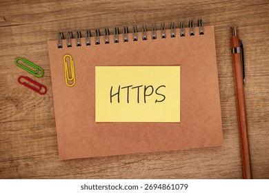 There is sticky note with the word HTTPS. It is an abbreviation for Hypertext Transfer Protocol Secure as eye-catching image.