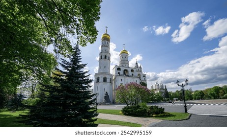 There is a very large white building that features a gold dome on its top - Powered by Shutterstock