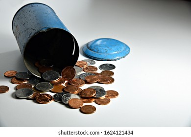 there were not many coins in saving cans that are pulled out - Shutterstock ID 1624121434