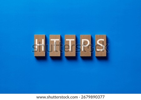 There is wood block with the word HTTPS. It is an abbreviation for Hypertext Transfer Protocol Secure as eye-catching image.