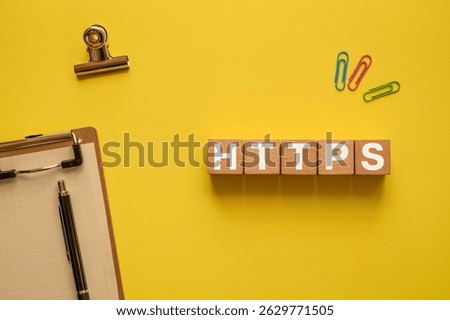 There is wood cube with the word HTTPS. It is an abbreviation for Hypertext Transfer Protocol Secure as eye-catching image.