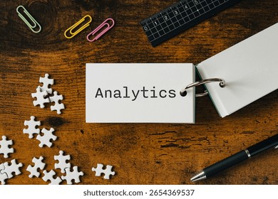 There is word card with the word Analytics. It is as an eye-catching image.