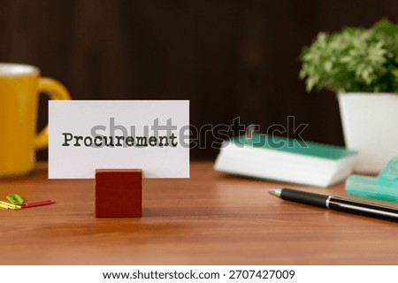 There is word card with the word Procurement. It is as an eye-catching image.