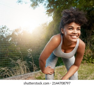 Theres Nothing Quite Like Setting A Personal Best. Shot Of A Sporty Young Woman Taking A Break After Her Run.