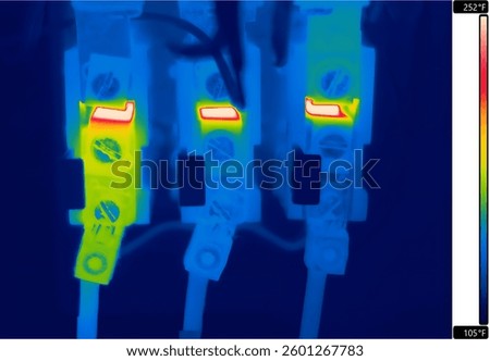 Thermal Image of Electrical connection in Breakers and cable show red appearance indicates High temperature in Close Up Shot