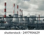 thermal power plant tubes. Industrial factory pollution, smokestack exhaust gases. Climate change global warming concept