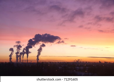 Thermoelectric station generanting smokes at the sunset