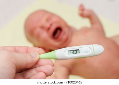 Thermometer With High Temperature And Sick Newborn Child With Allergy Rash Cries For Pain