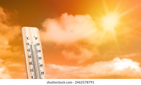 Thermometer with hot temperature with sky background. Environment, global warming, and climate change concept - Powered by Shutterstock